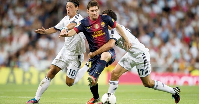 Liga : Le Barca et le Real dos à dos
